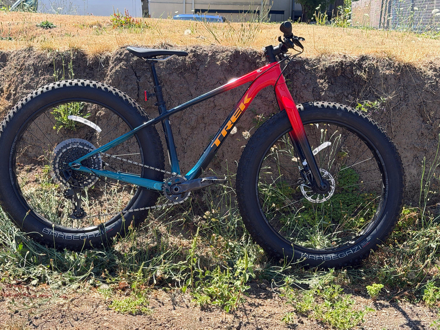 Trek Farley 9.6 Carbon fatbike SRAM Eagle 1x12 size small red blue teal fade MY2022