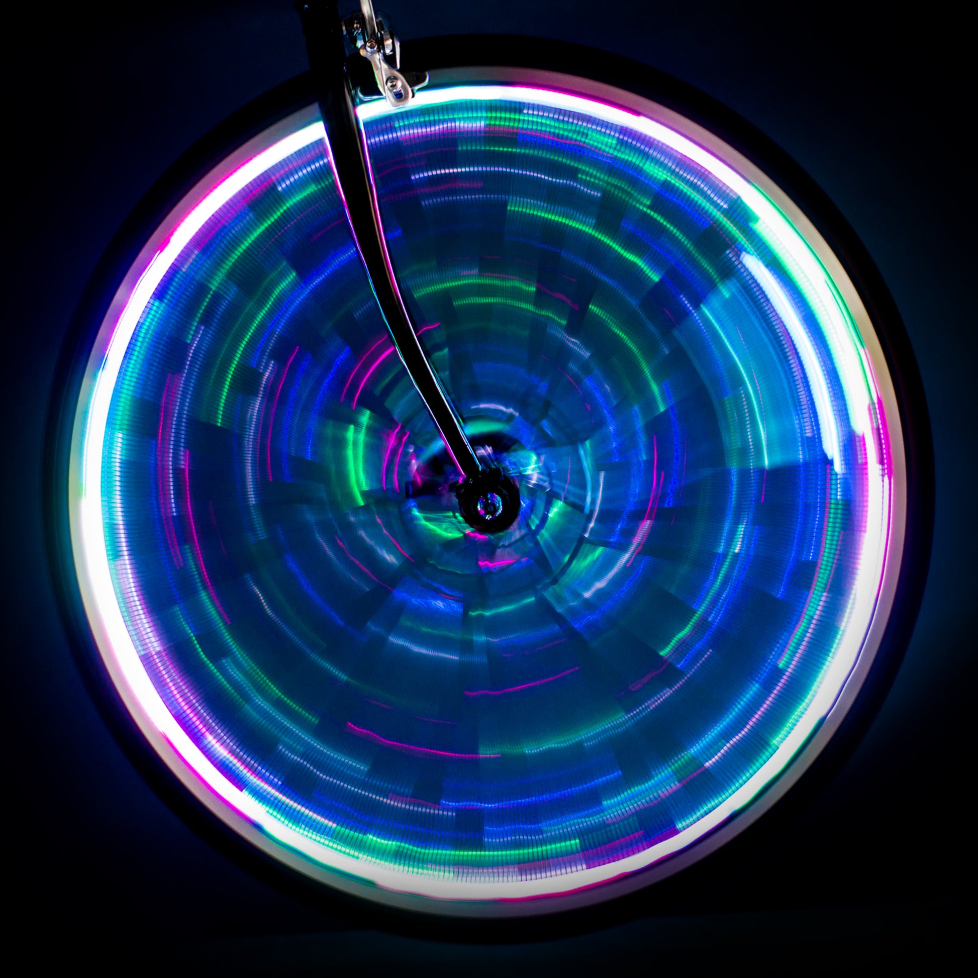 Bright Pastel color range disco LED lights on a spun bicycle wheel